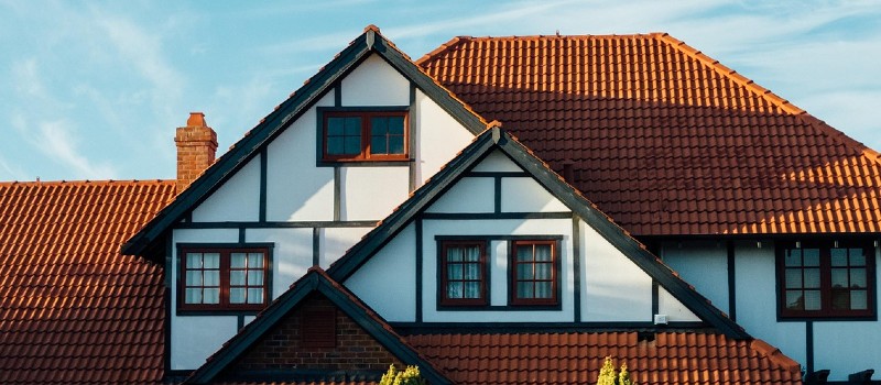 Illustration showing roof replacement cost breakdown for homeowners